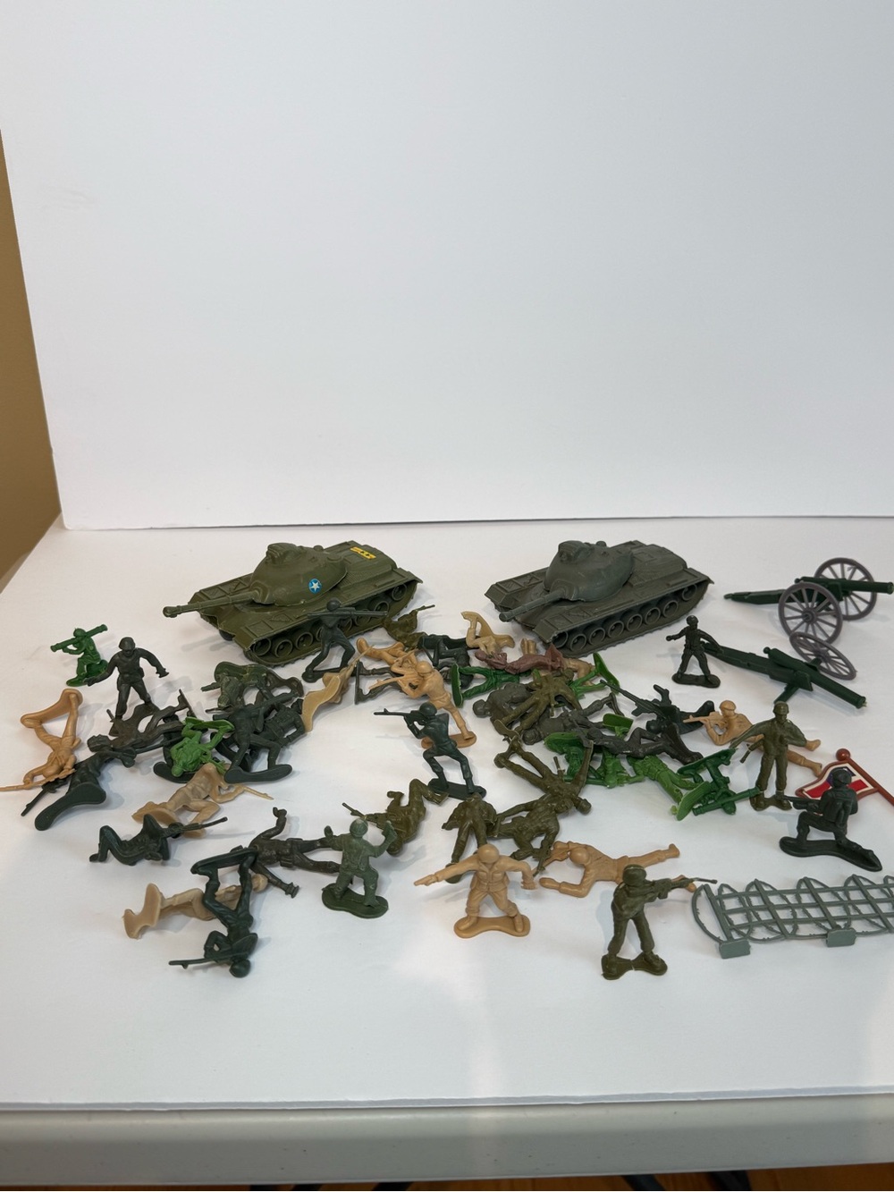 56 Piece Vintage Plastic Army Men/ Tanks - Various time periods